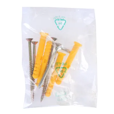 Set of yellow plugs and silver screws in a transparent plastic packaging, with recycling symbol PE-LD 04 on the packaging.