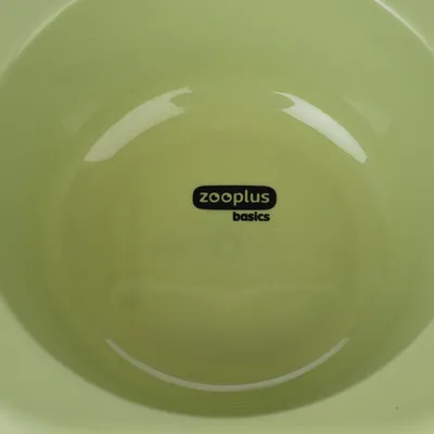 Zooplus Basics food bowl in light green with Zooplus logo on the inside.