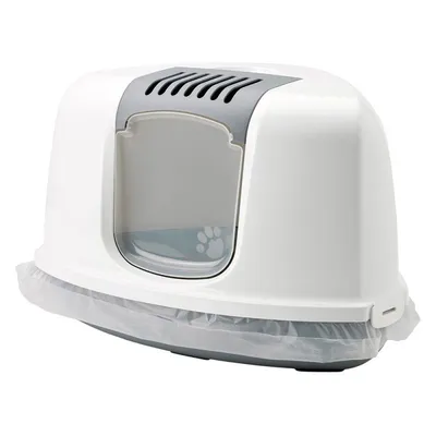 Kattenbak met kap, transparant klapdeurtje met pootafdruk, ventilatierooster bovenop, witte kunststof behuizing en plastic zak als binnenvoering zichtbaar.
