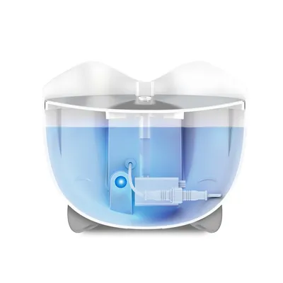 Querschnitt eines Trinkbrunnens mit Wasserbehälter, Pumpe und Filter. Zeigt die interne Funktionsweise des Geräts.