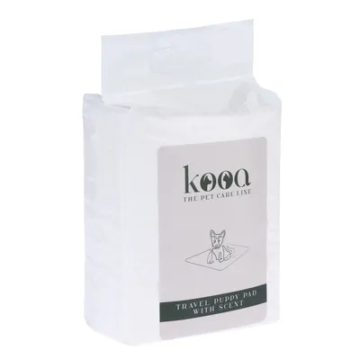 kooa The Pet Care Line. Travel Puppy Pad mit Duft, Verpackung zeigt Illustration eines Hundes auf einer Matte.