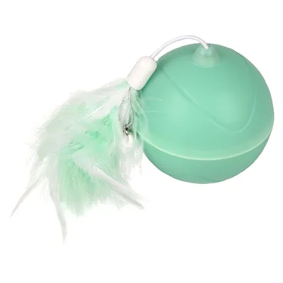 Green ball-shaped toy with white and green feathers, attached to a string with a plastic bead.