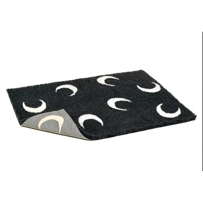 Schwarze Matte mit weissen Halbmond-Motiven, rechteckig und leicht umklappbar. Rückseite gestreift sichtbar.