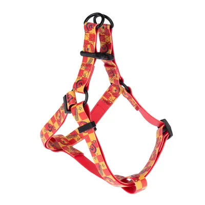 Red harness with yellow pattern, adjustable straps and black buckles.