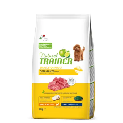 Natural Trainer Small & Toy Adult s teletino in rižem, 2 kg. Vidni sestavini: yucca schidigera, alga spirulina. Oznaka: brez barvil, konzervansov, dodanih sladkorjev.