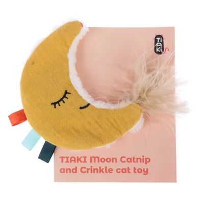 TIAKI Moon Catnip and Crinkle cat toy, yellow crescent moon with feathers and colourful ribbons on pink background.