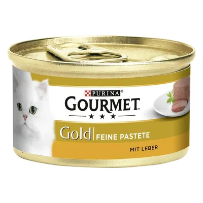 Purina Gourmet Gold нежный паштет с печенью, банка в золотой упаковке, изображение белой кошки и порция паштета на тарелке.