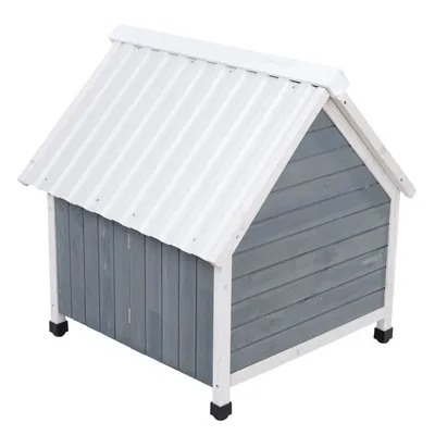 Casa para cães em madeira cinzenta com telhado branco e pés pretos, adequada para exterior.