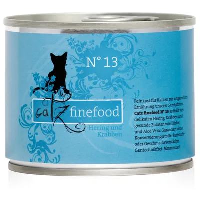 Catz finefood N° 13 Hering und Krabben, blå burk med svart katt och text om ingredienser på tyska. Synlig produkt- och varumärkesinformation.
