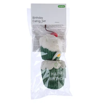 Zooplus Birthday Catnip Set, green fabric toy in cupcake shape with 'Happy Birthday' inscription, packed in transparent plastic cover.