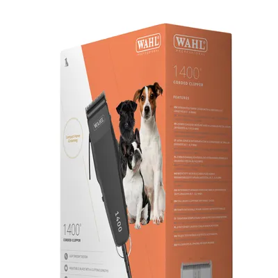 Wahl Professional 1400 sladdansluten klippmaskin. Förpackningen visar en hårklippare och tre hundar. Text: Compact Home Grooming, lätt konstruktion, justerbart blad med 6 klipplängder.