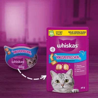 Whiskas Knuspertaschen mit Lachs, neue Verpackung mit 60% weniger Plastik, gleicher Geschmack. Inhalt: Vitamine, Mineralstoffe, Protein, unter 2 kcal pro Stück, 60g.