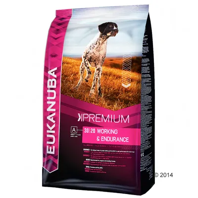 Saco de ração Eukanuba Premium 30/20 Working & Endurance para cães adultos, com imagem de cão e texto visível: Adult + Tame, All Breeds.