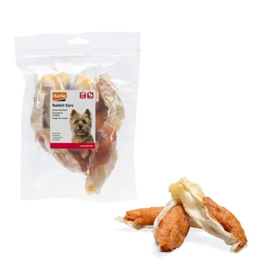 Friandises pour chiens Karlie Rabbit Ears, sachet transparent avec oreilles de lapin séchées visibles, étiquette mentionnant 'Rabbit Ears', sans gluten, www.karlie.de.