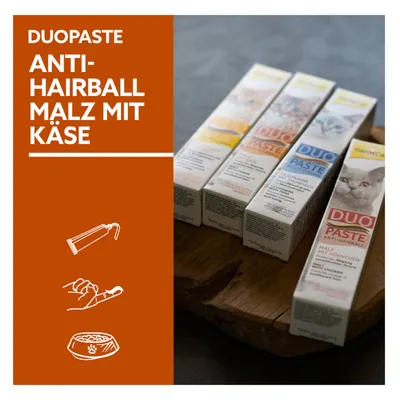 Duopaste Anti-Hairball Malz mit Käse. Produktverpackungen zeigen verschiedene Geschmacksrichtungen, darunter Malz mit Hühnchen und Malz mit Käse.