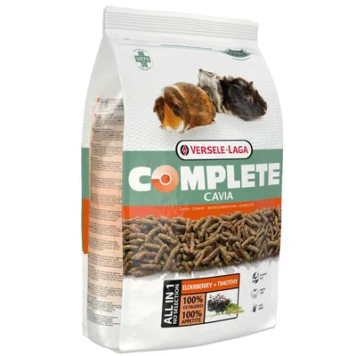 Sac de nourriture pour cobaye Versele-Laga Complete Cavia, texte visible : ELDERBERRY + TIMOTHY, 100% extrudé, 100% appétit, images de deux cochons d’Inde sur l’emballage.