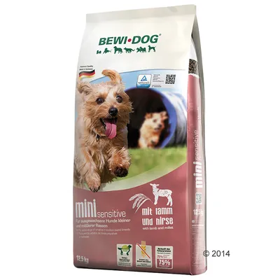 BEWI DOG mini sensitive with lamb and millet, 12.5 kg bag, visible text in German and English, image of small dog running on front packaging.