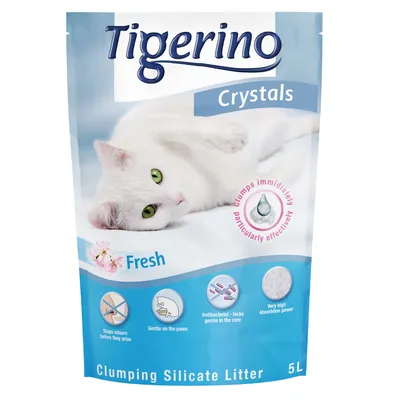 Tigerino Crystals Fresh, arena aglomerante de silicato para gatos, 5L. Texto visible en inglés: clumps immediately, antibacterial, very high absorption power, gentle on the paws.