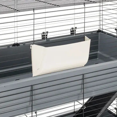 Grey metal cage with white feed trough attached to the inside of the cage. Suitable for small animals.