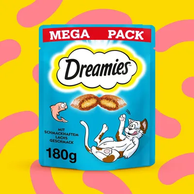 Dreamies Mega Pack, 180g, z okusom lososa. Embalaža prikazuje igrivo mačko in ribo.