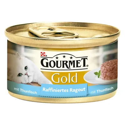 Консерва для кошек Gourmet Gold, Raffiniertes Ragout mit Thunfisch. На упаковке изображены белая кошка и порция рагу из тунца на тарелке.