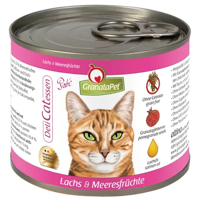 Konzerva GranataPet DeliCatessen Paté, Lachs & Meeresfrüchte. Obrázok mačky, text: Ohne Getreide, Granatapfelkerne, Lachsöl. Ružový pásik s názvom produktu.