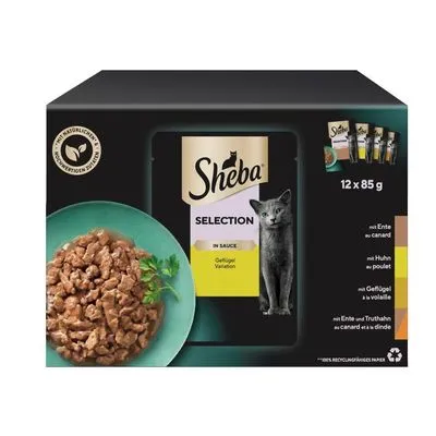 Sheba Selection in Sauce Gevogelte Variatie, 12 x 85 g. Met eend, kip, gevogelte, eend en kalkoen. Afbeelding van natvoer in saus en kat op de verpakking.