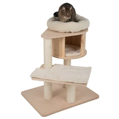 Cat tree made of wood with three levels, sisal posts and padded resting areas. A cat is lying in a soft bed at the top.