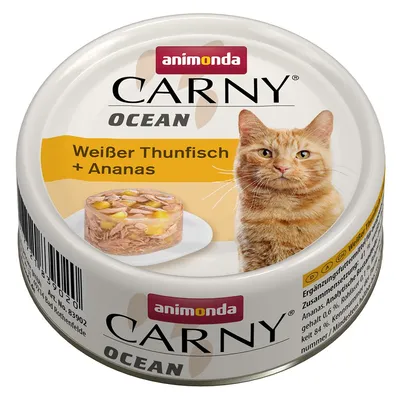 Scatoletta Animonda Carny Ocean per gatti, testo visibile: Weißer Thunfisch + Ananas, immagine di un gatto e porzione di tonno con ananas su piatto. Testo in tedesco.