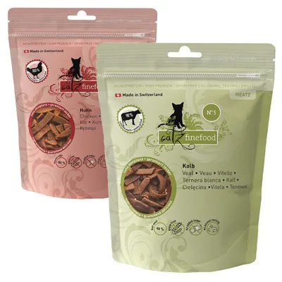 Catz finefood MEATZ, bolsas de snacks para gatos. Variedades visibles: Huhn (pollo) y Kalb (ternera blanca). Hecho en Suiza. 100 % y 98 % carne según el envase. Sin cereales ni azúcar añadido.