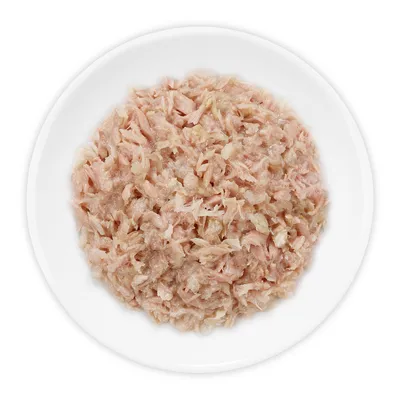Shredded wet food served on a white plate, showing texture and portion size for product comparison.
