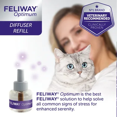 Feliway Optimum Diffuser Refill. Text states it helps solve all common signs of stress for enhanced serenity. Shows product bottle and a cat being held.