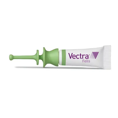 Pipette avec embout vert, texte visible : Vectra Felis Pipette avec embout vert, texte visible : Vectra Felis
