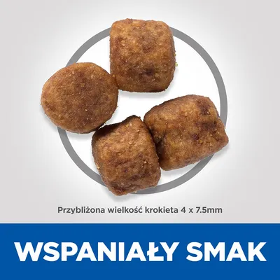 Cztery krokiety karmy, przybliżona wielkość 4 × 7,5 mm. Widoczny napis: WSPANIAŁY SMAK.
