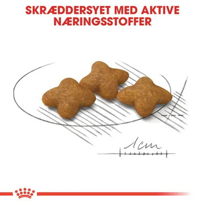 Tre foderpiller, hver ca. 1 cm, med teksten: SKRÆDDERSYET MED AKTIVE NÆRINGSSTOFFER. Illustration viser størrelse og form på foderet.