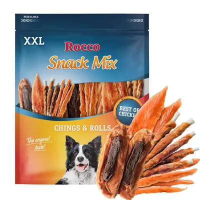 Rocco Snack Mix XXL, CHINGS & ROLLS, BEST OF CHICKEN. Bolsa con snacks para perros y variedad de tiras visibles. Imagen de perro en el envase. Texto: The original taste!