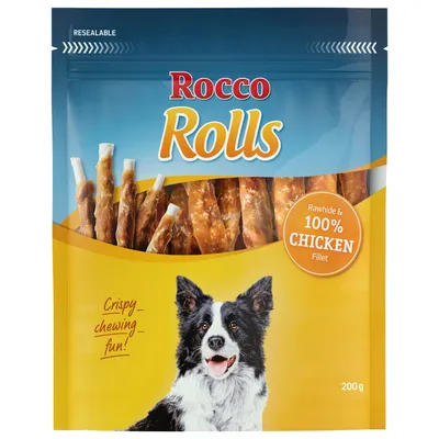 Rocco Rolls, Rawhide & 100% Chicken Fillet, sachet de 200 g. Texte visible : Crispy_chewing_fun! Illustration d’un chien noir et blanc sur l’emballage.