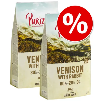 Two bags labelled 'Venison with Rabbit, 80% animal ingredients, 20% vegetables, 0% grain, adult dogs' with a red percentage discount symbol in the corner.