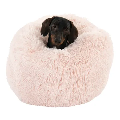 Cama para mascotas rosa, mullida, de diseño redondo y superficie suave.