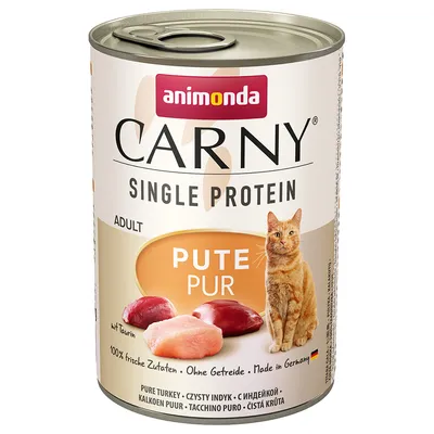 Carny Single Protein Adult, pure turkey with taurine, 100% fresh ingredients, grain-free, made in Germany. Image shows meat pieces and a cat beside product details.
