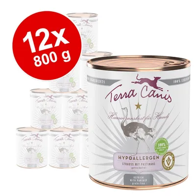 Lot de 12 boîtes Terra Canis Hypoallergen pour chien, 800 g chacune, saveur autruche avec panais, sans céréales. Texte visible : 100 % ingrédients naturels, qualité alimentaire humaine.