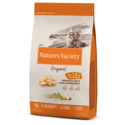 Упаковка корма для кошек Nature’s Variety Original, 7 кг, с курицей без костей 1,5 кг как основной ингредиент. Видны кусочки курицы и зерновые на упаковке. Текст на английском.