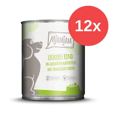 Mjamjam comida húmeda de ternera con patatas cocidas y guisantes crujientes, sin cereales, alto contenido en carne. El envase muestra un perro e indica paquete de 12.