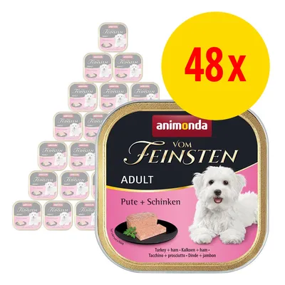 Lot de 48 barquettes Animonda Vom Feinsten Adult, dinde et jambon, avec photo d’un petit chien blanc sur l’emballage. Texte visible : Pute + Schinken, Turkey + ham, Kalkoen + ham.