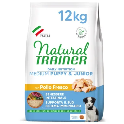 Natural Trainer Daily Nutrition Medium Puppy & Junior con Pollo Fresco, 12 kg. Benessere intestinale, supporta il sistema immunitario. Preparato in Italia. Immagine di cucciolo e pollo. Natural Trainer Daily Nutrition Medium Puppy & Junior con Pollo Fresco, 12 kg. Benessere intestinale, supporta il sistema immunitario. Preparato in Italia. Immagine di cucciolo e pollo.