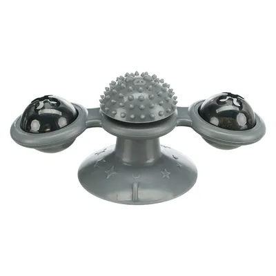 Šedá plastová interaktivní hračka pro kočky se dvěma průhlednými kapslemi a středovou částí s masážními hroty, přísavka na spodní straně.