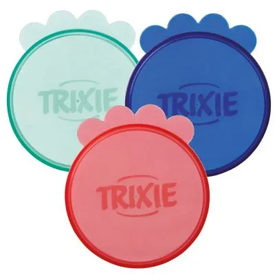 Coperchi rotondi in plastica con scritta TRIXIE, nei colori rosa, blu e verde chiaro, con bordo a forma di zampa visibile.