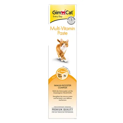 GimCat Multi-Vitamin Paste, boîte avec chat, texte visible : 12 Vitamins, Beta-Glucan, Oils, Immun-Booster Complex, Premium Quality, recommandé par vétérinaires.
