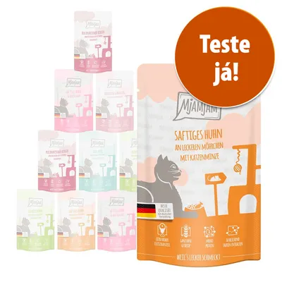 Vários pacotes de comida para gatos MjAMjAM. Em destaque: embalagem com texto 'SAFTIGES HUHN AN LECKEREN MÖHRCHEN MIT KATZENMINZE'. Selo laranja: 'Teste já!'.