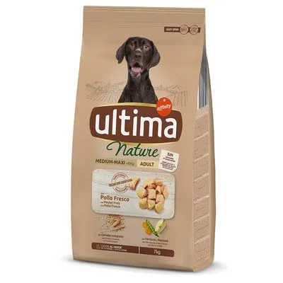 Zak Ultima Nature Medium-Maxi Adult hondenvoer, Pollo Fresco, 7 kg. Afbeelding van kipblokjes en groenten op de verpakking. Merknaam en productinformatie duidelijk zichtbaar. Zak Ultima Nature Medium-Maxi Adult hondenvoer, Pollo Fresco, 7 kg. Afbeelding van kipblokjes en groenten op de verpakking. Merknaam en productinformatie duidelijk zichtbaar.